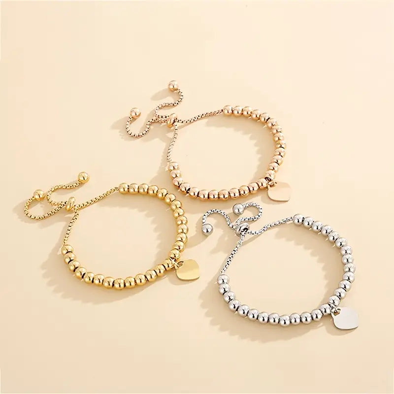 Radiate Love and Elegance with Our Titanium Steel Love Heart Pendant 18K Gold-Plated Bracelet - A Symbol of Timeless Affection and Style, Available in Gold with a Silver Option